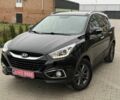 Чорний Хендай іх35, об'ємом двигуна 2 л та пробігом 240 тис. км за 14999 $, фото 1 на Automoto.ua