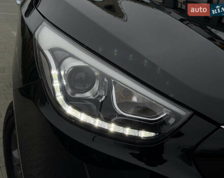 Чорний Хендай іх35, об'ємом двигуна 2 л та пробігом 240 тис. км за 15800 $, фото 7 на Automoto.ua