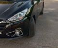 Черный Хендай их35, объемом двигателя 2 л и пробегом 182 тыс. км за 17599 $, фото 5 на Automoto.ua