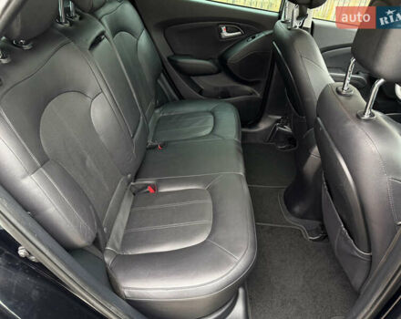 Чорний Хендай іх35, об'ємом двигуна 2 л та пробігом 240 тис. км за 15800 $, фото 26 на Automoto.ua