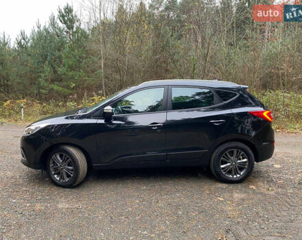 Чорний Хендай іх35, об'ємом двигуна 2 л та пробігом 160 тис. км за 15599 $, фото 4 на Automoto.ua