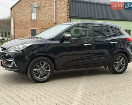 Чорний Хендай іх35, об'ємом двигуна 2 л та пробігом 240 тис. км за 15499 $, фото 1 на Automoto.ua