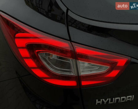 Чорний Хендай іх35, об'ємом двигуна 2 л та пробігом 240 тис. км за 15800 $, фото 11 на Automoto.ua