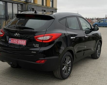 Чорний Хендай іх35, об'ємом двигуна 2 л та пробігом 240 тис. км за 14999 $, фото 3 на Automoto.ua