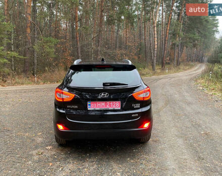 Чорний Хендай іх35, об'ємом двигуна 2 л та пробігом 160 тис. км за 15599 $, фото 10 на Automoto.ua
