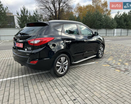 Чорний Хендай іх35, об'ємом двигуна 2 л та пробігом 164 тис. км за 17100 $, фото 4 на Automoto.ua