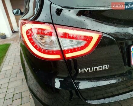Черный Хендай их35, объемом двигателя 2 л и пробегом 152 тыс. км за 14950 $, фото 4 на Automoto.ua