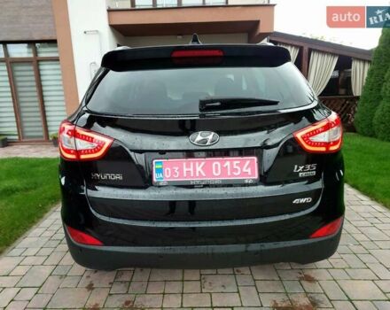 Черный Хендай их35, объемом двигателя 2 л и пробегом 152 тыс. км за 14950 $, фото 7 на Automoto.ua