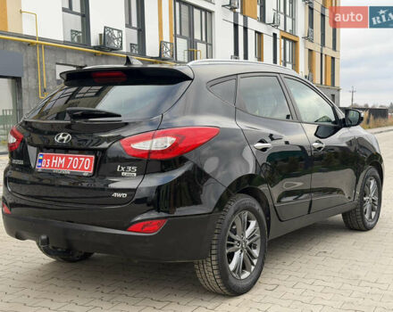 Чорний Хендай іх35, об'ємом двигуна 2 л та пробігом 240 тис. км за 15499 $, фото 5 на Automoto.ua