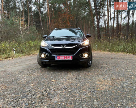 Чорний Хендай іх35, об'ємом двигуна 2 л та пробігом 160 тис. км за 15599 $, фото 1 на Automoto.ua