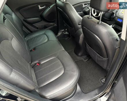 Чорний Хендай іх35, об'ємом двигуна 2 л та пробігом 240 тис. км за 15800 $, фото 25 на Automoto.ua