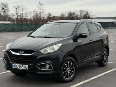 Черный Хендай их35, объемом двигателя 1.69 л и пробегом 203 тыс. км за 11699 $, фото 1 на Automoto.ua