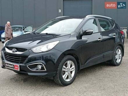 Черный Хендай их35, объемом двигателя 2 л и пробегом 200 тыс. км за 10990 $, фото 1 на Automoto.ua