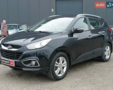 Чорний Хендай іх35, об'ємом двигуна 2 л та пробігом 200 тис. км за 10990 $, фото 1 на Automoto.ua