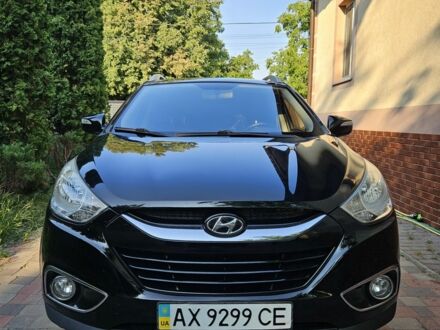 Черный Хендай их35, объемом двигателя 2 л и пробегом 101 тыс. км за 12100 $, фото 1 на Automoto.ua