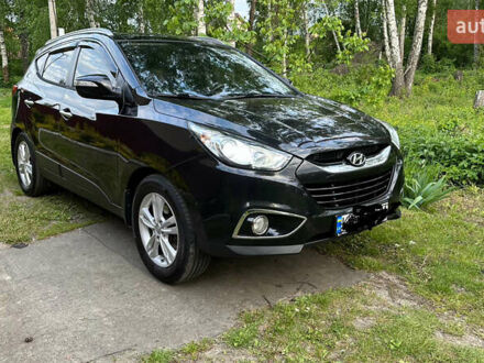 Черный Хендай их35, объемом двигателя 2 л и пробегом 270 тыс. км за 10700 $, фото 1 на Automoto.ua