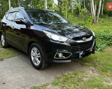 Черный Хендай их35, объемом двигателя 2 л и пробегом 270 тыс. км за 10700 $, фото 1 на Automoto.ua
