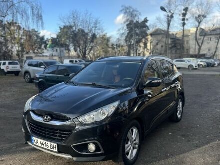 Чорний Хендай іх35, об'ємом двигуна 2 л та пробігом 190 тис. км за 10500 $, фото 1 на Automoto.ua
