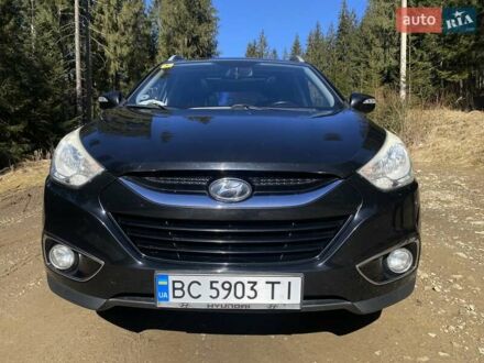 Чорний Хендай іх35, об'ємом двигуна 2 л та пробігом 228 тис. км за 10900 $, фото 1 на Automoto.ua
