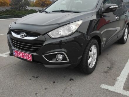 Черный Хендай их35, объемом двигателя 2 л и пробегом 249 тыс. км за 11900 $, фото 1 на Automoto.ua