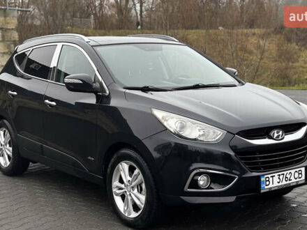 Чорний Хендай іх35, об'ємом двигуна 2 л та пробігом 178 тис. км за 12350 $, фото 1 на Automoto.ua