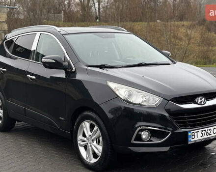Чорний Хендай іх35, об'ємом двигуна 2 л та пробігом 178 тис. км за 12350 $, фото 1 на Automoto.ua