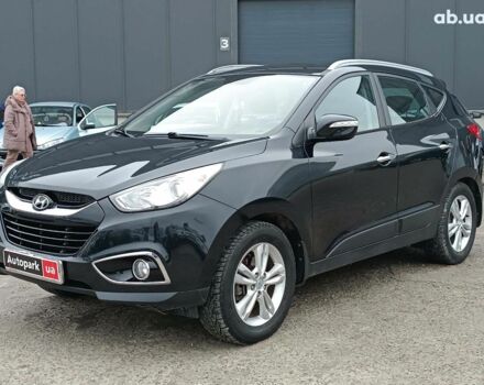 Чорний Хендай іх35, об'ємом двигуна 2 л та пробігом 200 тис. км за 10990 $, фото 1 на Automoto.ua