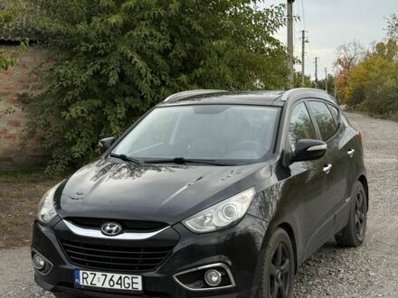 Черный Хендай их35, объемом двигателя 2 л и пробегом 237 тыс. км за 7100 $, фото 1 на Automoto.ua