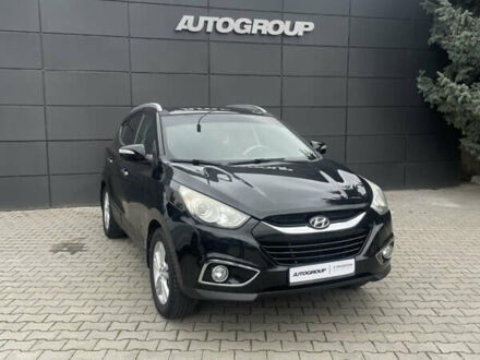 Черный Хендай их35, объемом двигателя 2 л и пробегом 179 тыс. км за 12000 $, фото 1 на Automoto.ua