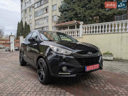 Черный Хендай их35, объемом двигателя 2 л и пробегом 200 тыс. км за 12800 $, фото 1 на Automoto.ua