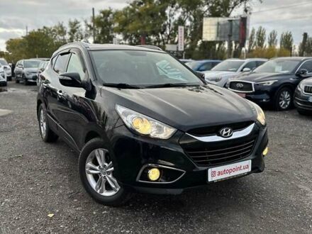 Чорний Хендай іх35, об'ємом двигуна 2 л та пробігом 157 тис. км за 12700 $, фото 1 на Automoto.ua