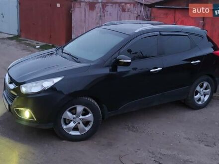 Чорний Хендай іх35, об'ємом двигуна 2 л та пробігом 217 тис. км за 11700 $, фото 1 на Automoto.ua