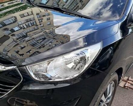 Черный Хендай их35, объемом двигателя 2 л и пробегом 161 тыс. км за 12600 $, фото 1 на Automoto.ua