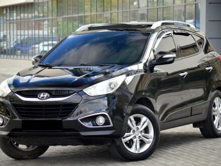 Черный Хендай их35, объемом двигателя 2 л и пробегом 141 тыс. км за 12700 $, фото 1 на Automoto.ua