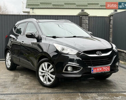 Чорний Хендай іх35, об'ємом двигуна 2 л та пробігом 206 тис. км за 13099 $, фото 1 на Automoto.ua
