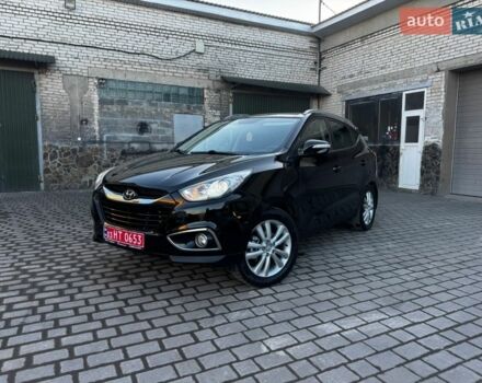 Чорний Хендай іх35, об'ємом двигуна 2 л та пробігом 174 тис. км за 14350 $, фото 1 на Automoto.ua