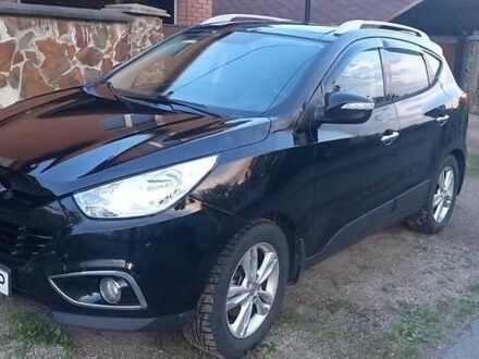Хендай іх35 2011 у Борисполе на Automoto.ua Чорний Хендай іх35, об'ємом двигуна 2 л та пробігом 200 тис. км за 14500 $, фото 1 на Automoto.ua