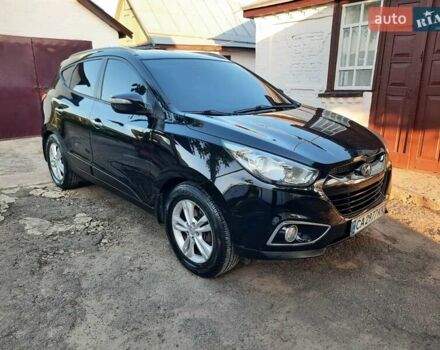 Черный Хендай их35, объемом двигателя 2 л и пробегом 209 тыс. км за 11950 $, фото 1 на Automoto.ua