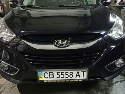 Чорний Хендай іх35, об'ємом двигуна 2 л та пробігом 157 тис. км за 12000 $, фото 1 на Automoto.ua
