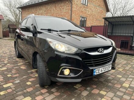 Чорний Хендай іх35, об'ємом двигуна 2 л та пробігом 210 тис. км за 12700 $, фото 1 на Automoto.ua