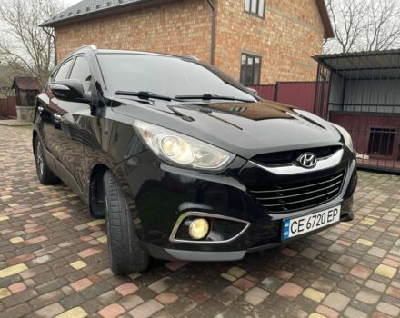 Черный Хендай их35, объемом двигателя 2 л и пробегом 210 тыс. км за 12700 $, фото 1 на Automoto.ua