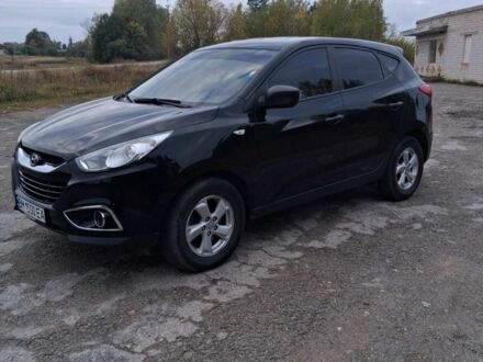 Чорний Хендай іх35, об'ємом двигуна 1.7 л та пробігом 215 тис. км за 13000 $, фото 1 на Automoto.ua