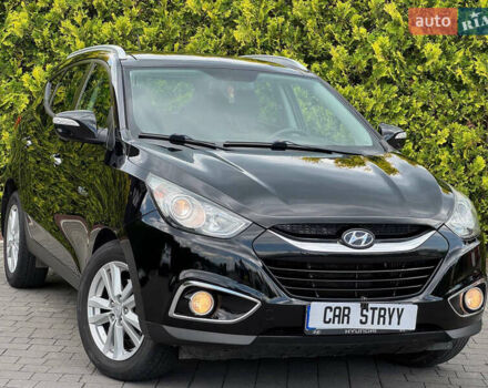 Черный Хендай их35, объемом двигателя 1.69 л и пробегом 238 тыс. км за 11999 $, фото 1 на Automoto.ua