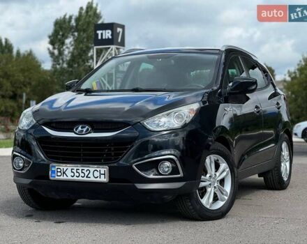 Чорний Хендай іх35, об'ємом двигуна 2 л та пробігом 204 тис. км за 12300 $, фото 1 на Automoto.ua