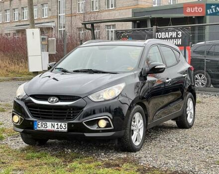 Чорний Хендай іх35, об'ємом двигуна 2 л та пробігом 195 тис. км за 12800 $, фото 1 на Automoto.ua