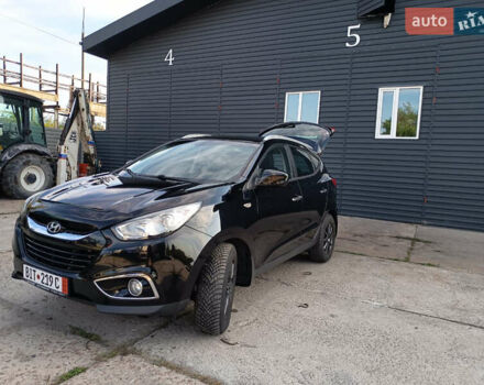 Черный Хендай их35, объемом двигателя 2 л и пробегом 195 тыс. км за 12600 $, фото 1 на Automoto.ua