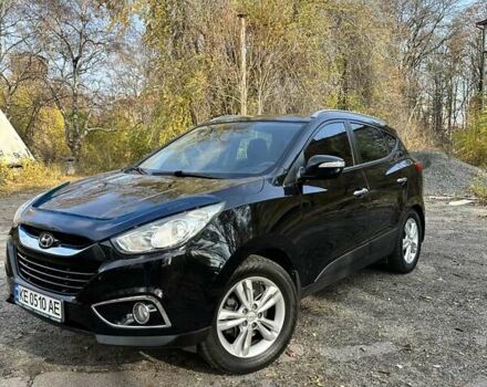 Черный Хендай их35, объемом двигателя 2 л и пробегом 137 тыс. км за 14000 $, фото 1 на Automoto.ua