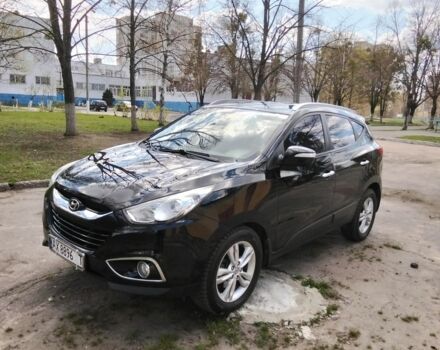 Чорний Хендай іх35, об'ємом двигуна 2 л та пробігом 180 тис. км за 12999 $, фото 1 на Automoto.ua