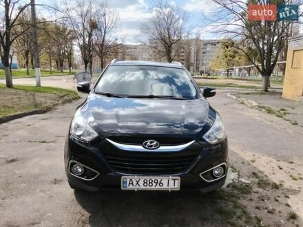 Черный Хендай их35, объемом двигателя 2 л и пробегом 180 тыс. км за 12999 $, фото 1 на Automoto.ua