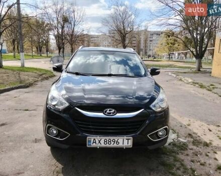 Чорний Хендай іх35, об'ємом двигуна 2 л та пробігом 180 тис. км за 12999 $, фото 1 на Automoto.ua